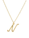 Script initial letter N charm necklace dangled in a gold-filled paperclip chain.