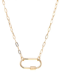 A gold chain necklace featuring a large, minimalist oval carabiner pendant with a small rectangular clasp, displayed on a clean white background.