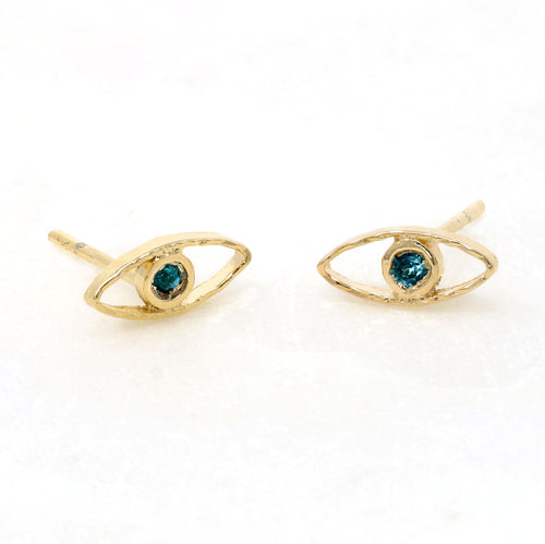 A pair of this  evil eye Earring is accent with a tiny blue zircon CZ stone.