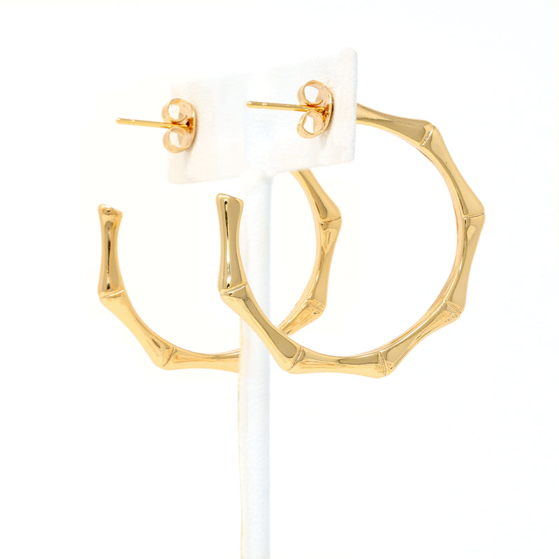 bamboo-inspired hoop earrings in gold.