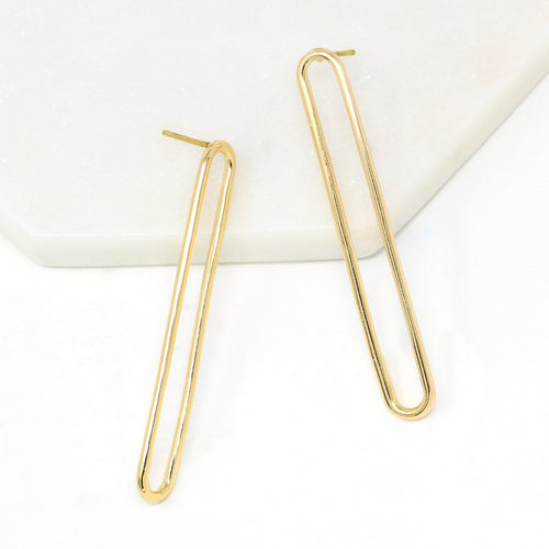 simple and modern long drop earrings in gold.