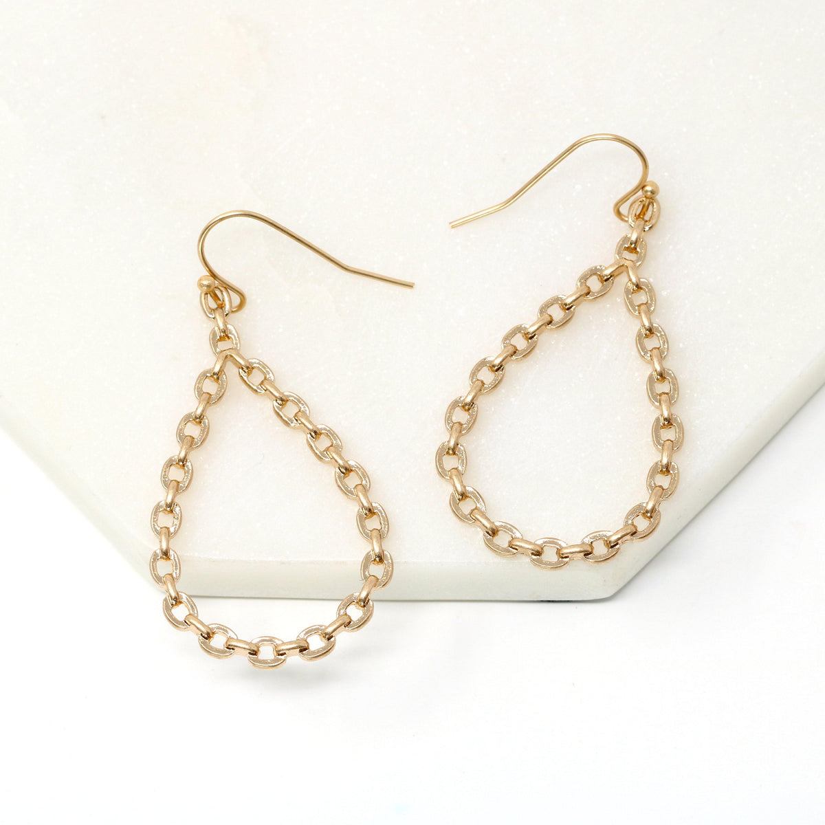 A pair of lightweight teardrop chain earrings with a sleek wired design, offering a modern and stylish touch to any outfit.