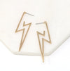 A pair of modern lightning bold hoop earrings in gold.