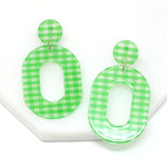  A pair of striped resin drop and dangle earrings in light green color. 