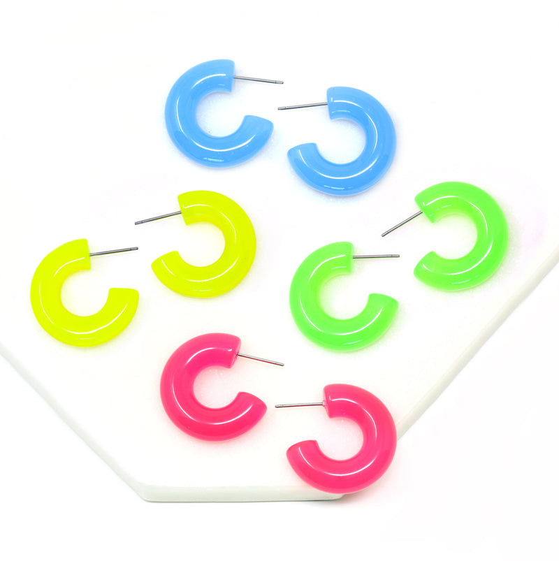 Featuring a pair of minimalist design bold resin hoop earrings crafted with high-quality neon colored resin material, adding a pop of color to any outfit.