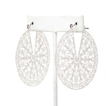 A pair of lightweight filigree statement hoop earrings in latch back closures.