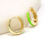A pair of neon green epoxy color painted 15mm small huggie earrings.