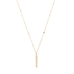 A simple  skinny bar charm short necklace in gold.