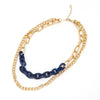 A set of double layered chain necklace mixed with navy blue resin link chain.