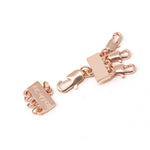 A detangler clasp in rose gold for a 3 layered or multiple layered necklace.