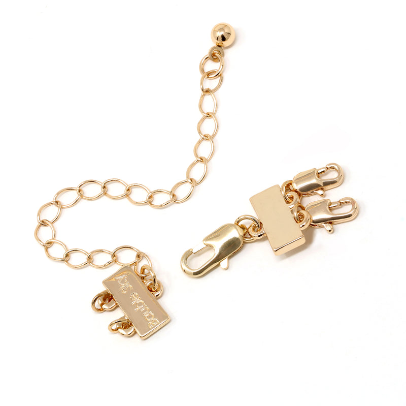 A detangler clasp in gold for a 2 layered or a multiple layered necklace.