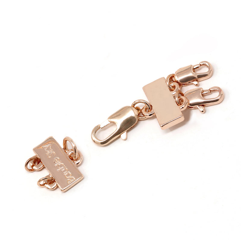 A detangler clasp in rose gold for a double layered or a multiple layered necklace.