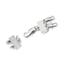 A detangler clasp in silver for a double layered or a multiple layered necklace.