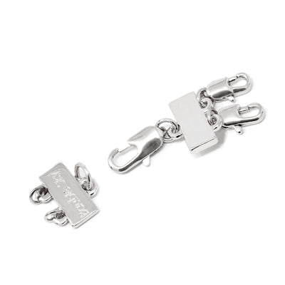 A detangler clasp in silver for a double layered or a multiple layered necklace.